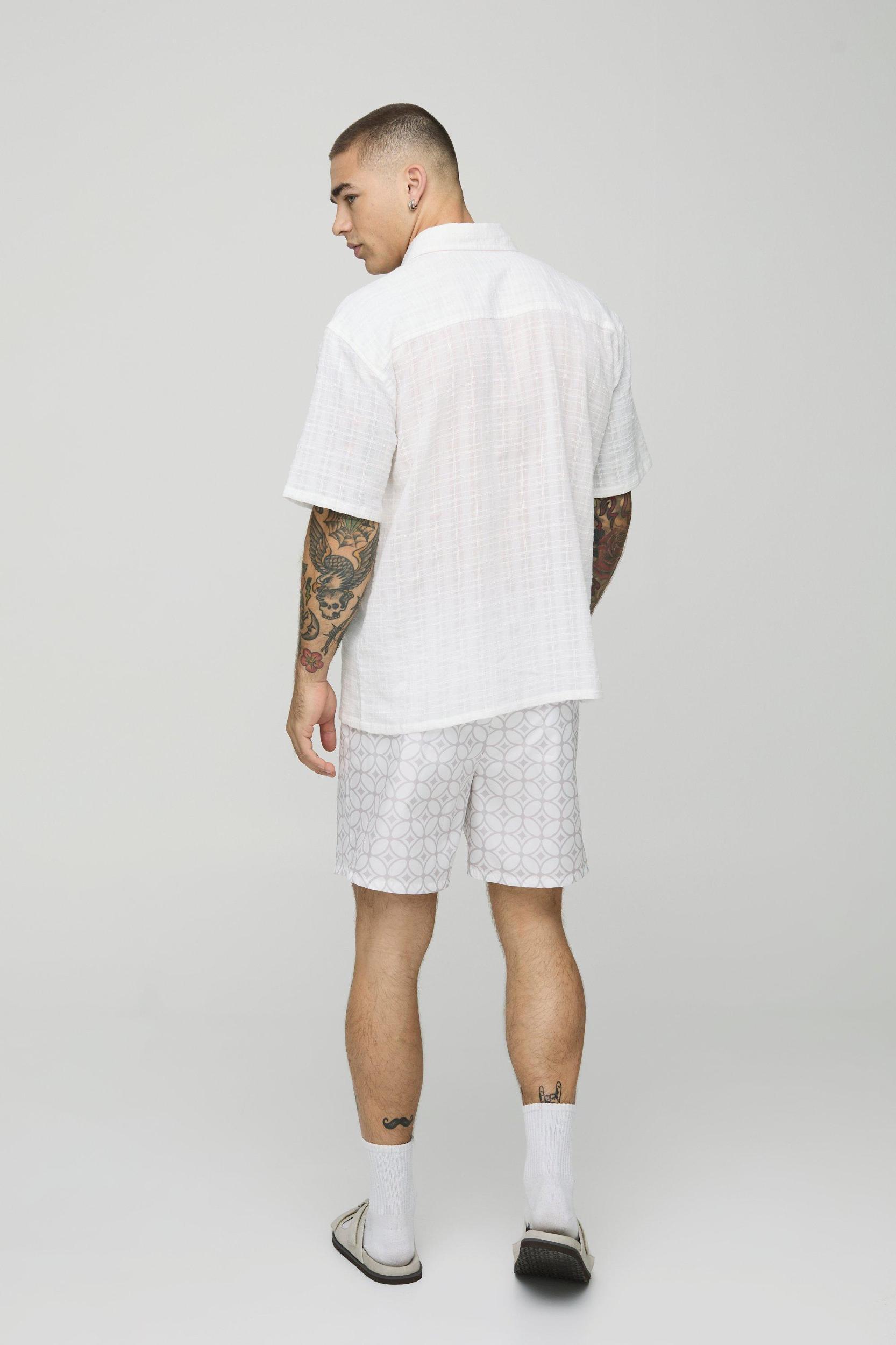 Abstract Pattern Mid Length Swim Trunks | boohooMAN USA Product Image