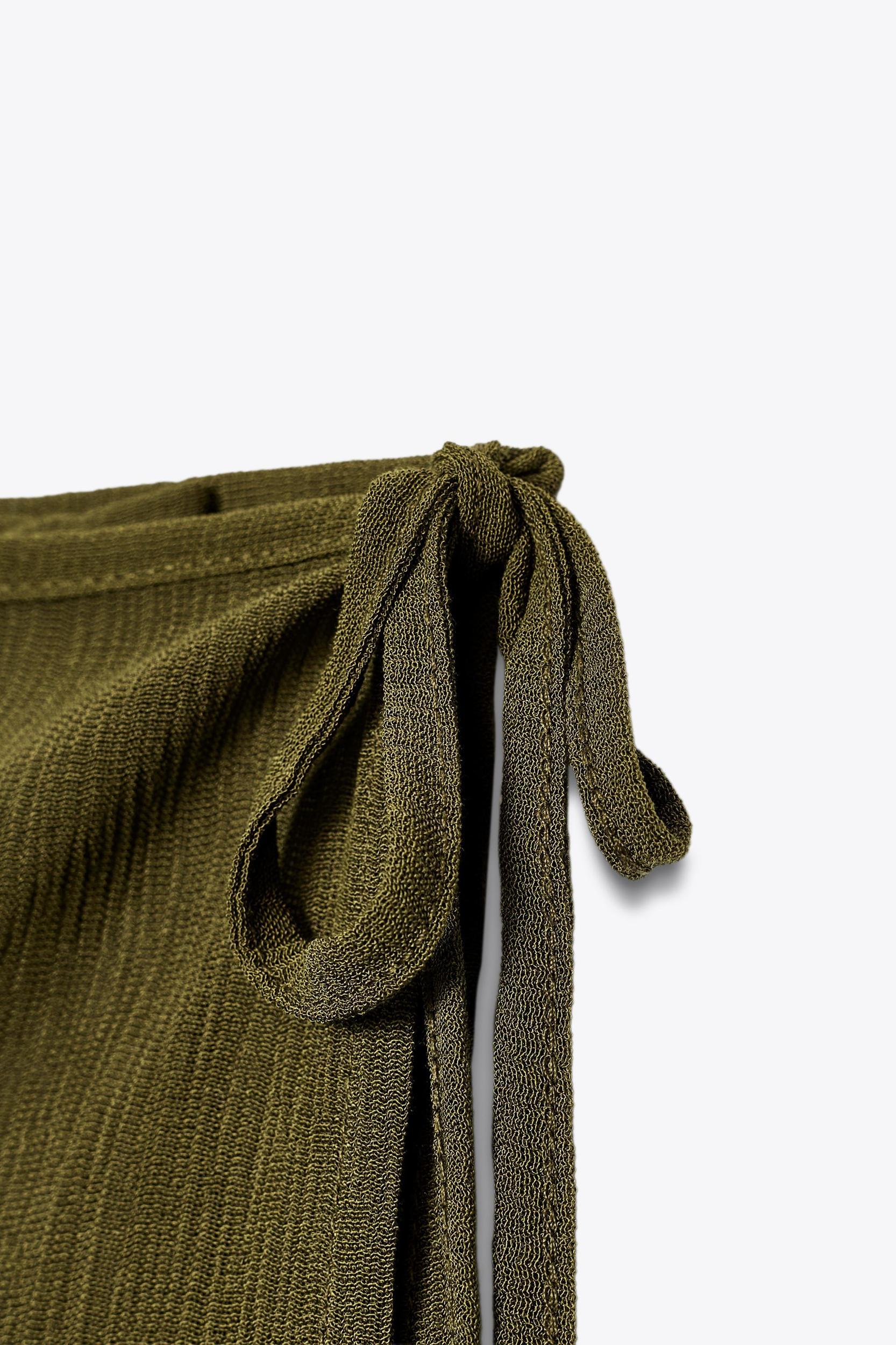 SEMI-SHEER TEXTURED ASYMMETRIC TOP Product Image