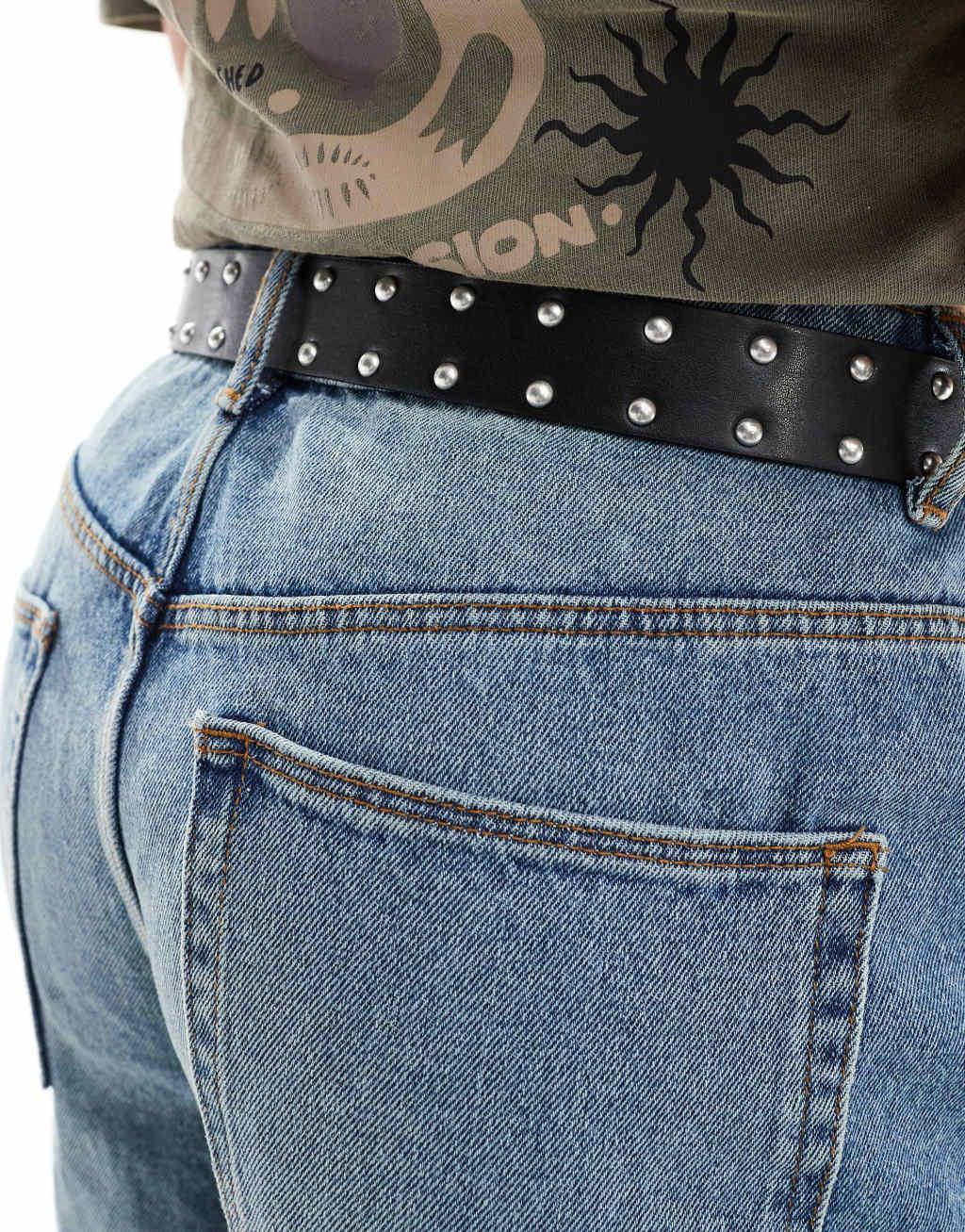 ASOS DESIGN faux leather studded belt with roller buckle in black Product Image