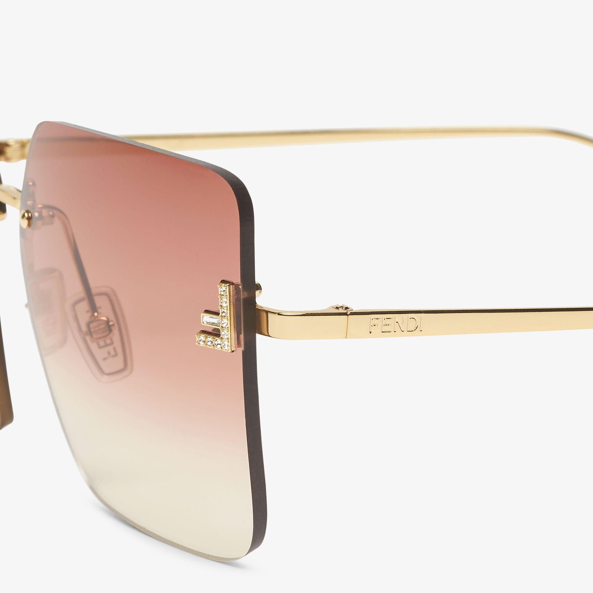 Fendi First CrystalGold metal sunglasses with pink gradient lenses Product Image