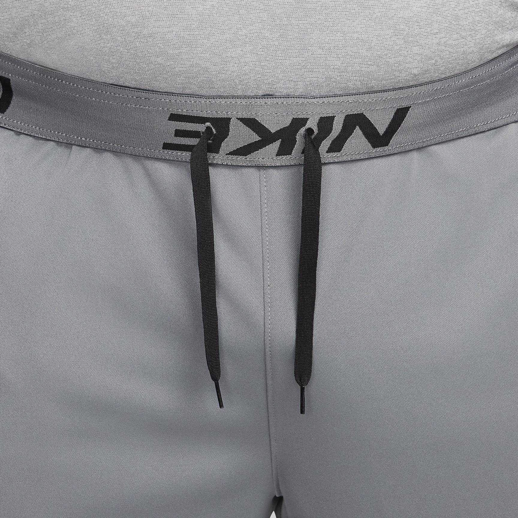 Nike Mens Totality Dri-FIT Tapered Versatile Pants | FB7509-084 Product Image