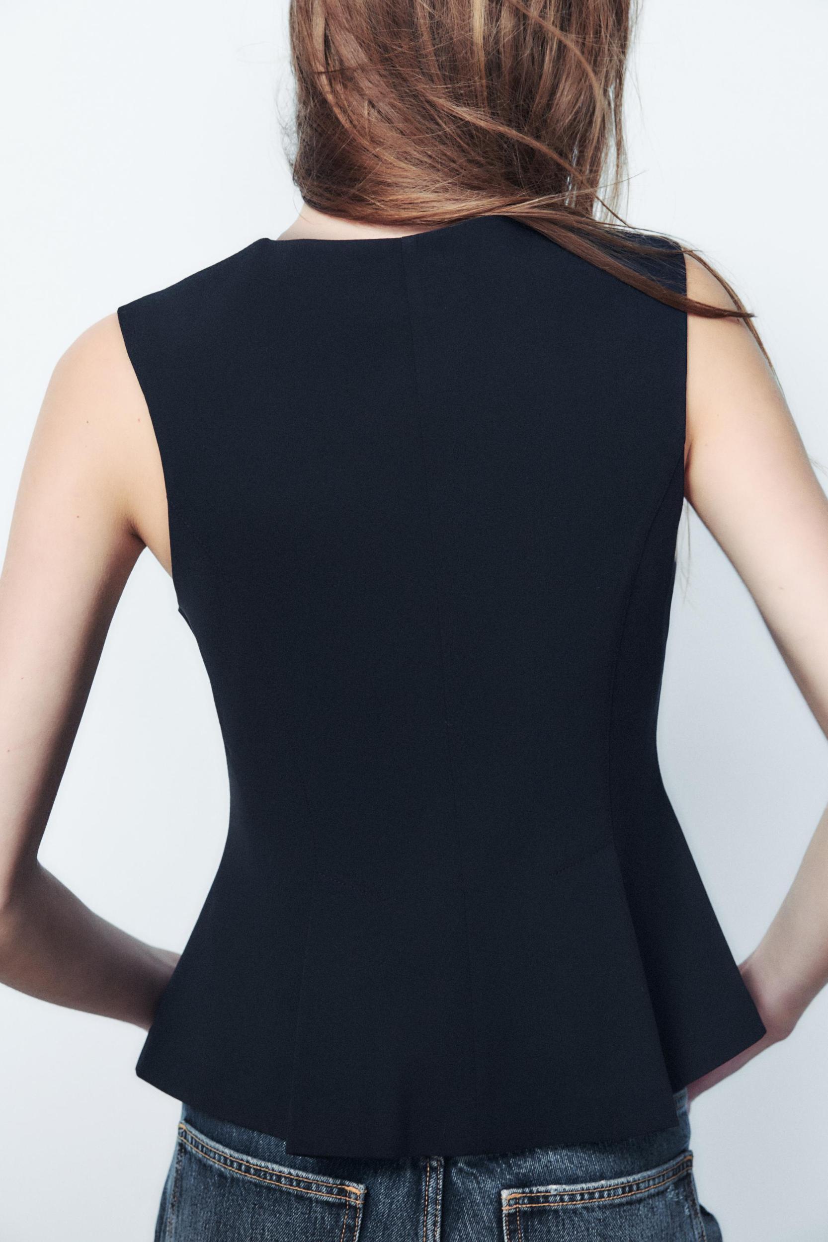 DART PEPLUM TOP Product Image
