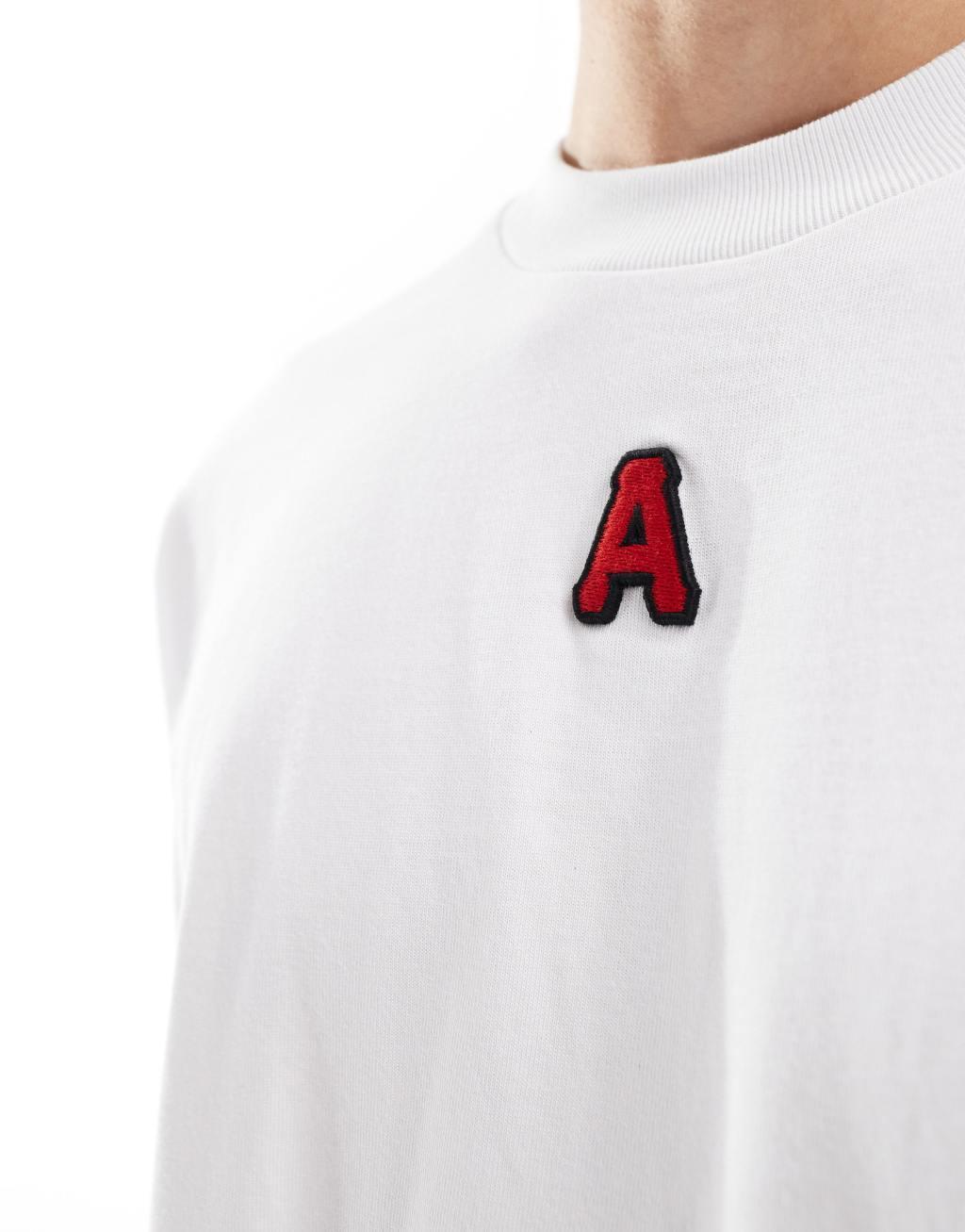 Aape by A Bathing Ape embossed logo t-shirt in white Product Image