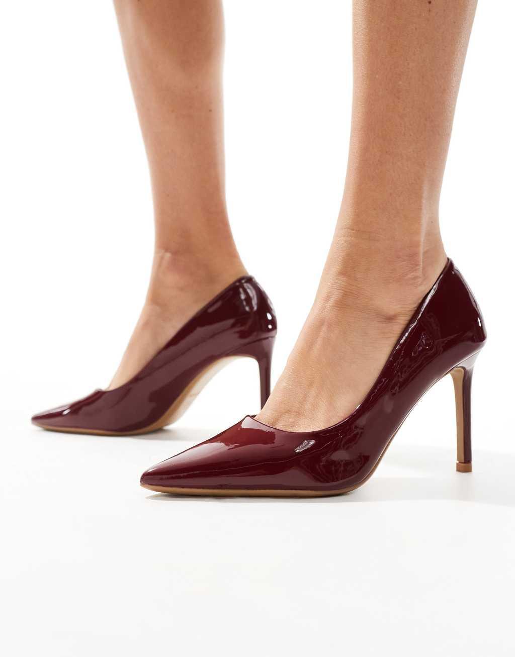 SEQWL pointed toe pumps with stiletto heels in burgundy patent Product Image