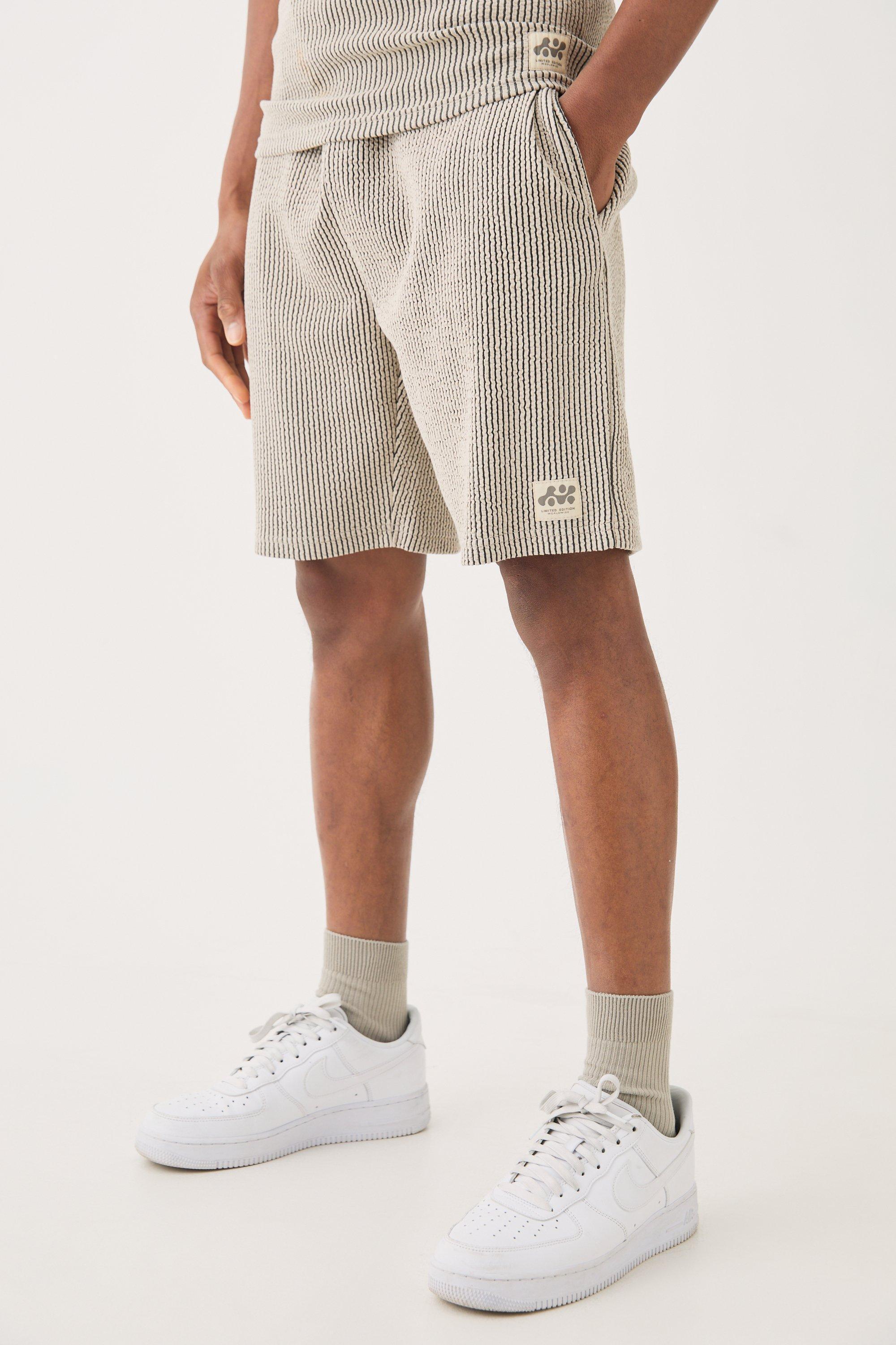 Relaxed Mid Length Textured Short With Woven Tab | boohooMAN USA Product Image