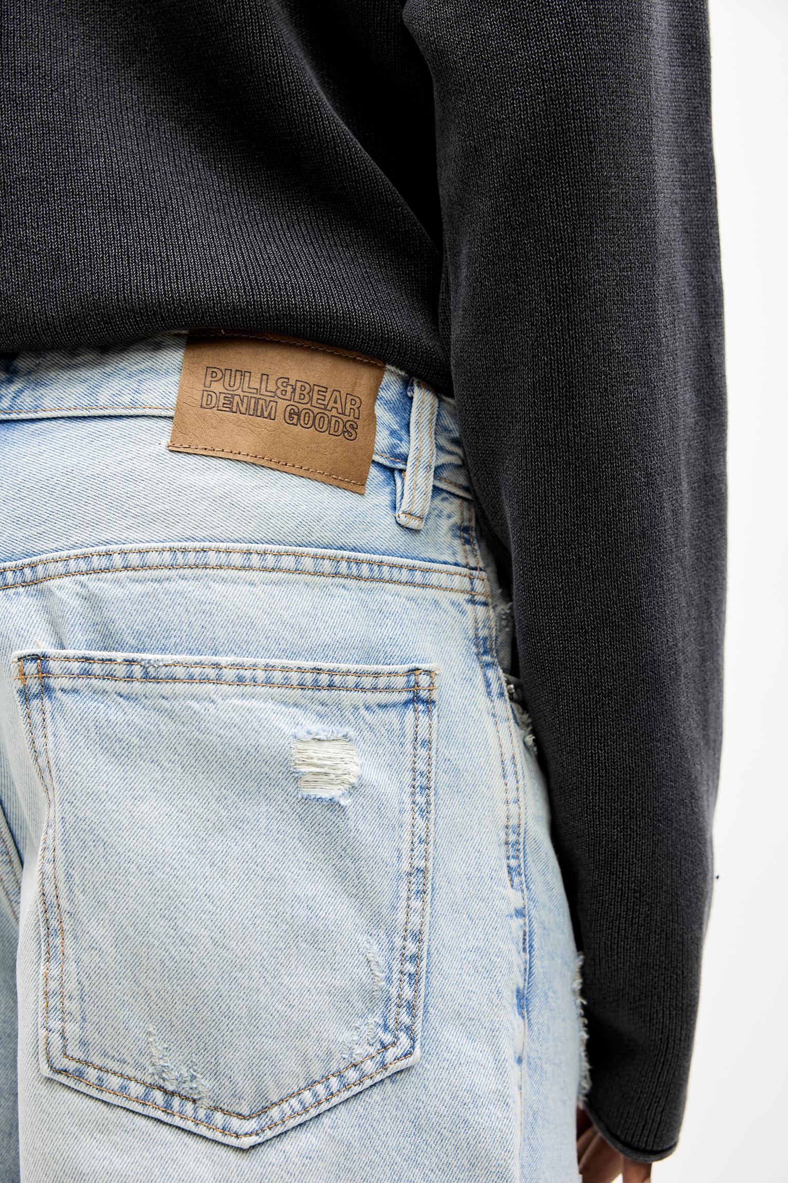 Ripped straight fit denim Bermuda shorts Product Image