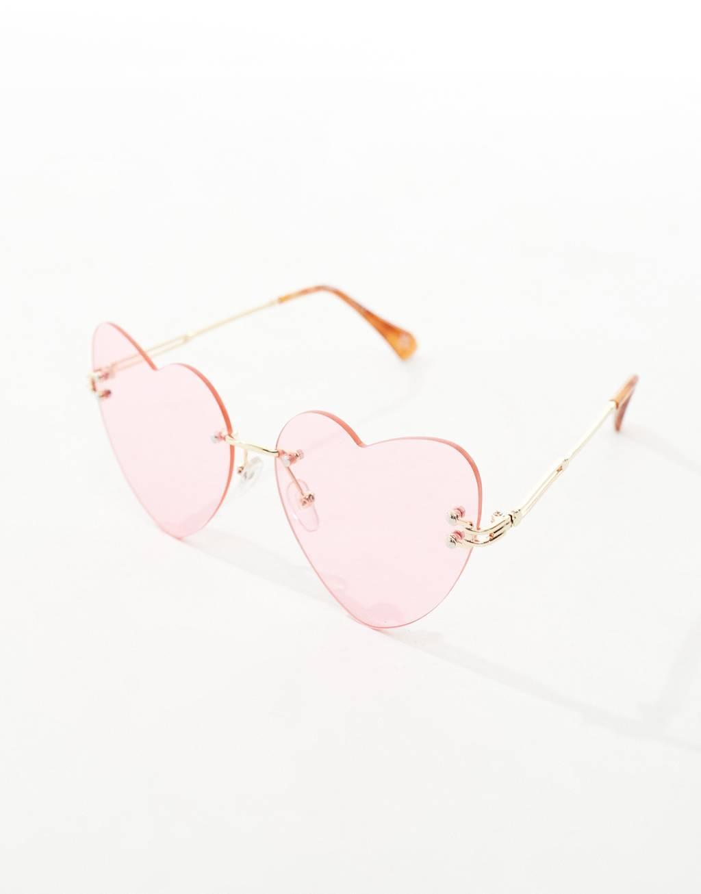 AIRE cosmic love heart sunglasses in pink Product Image