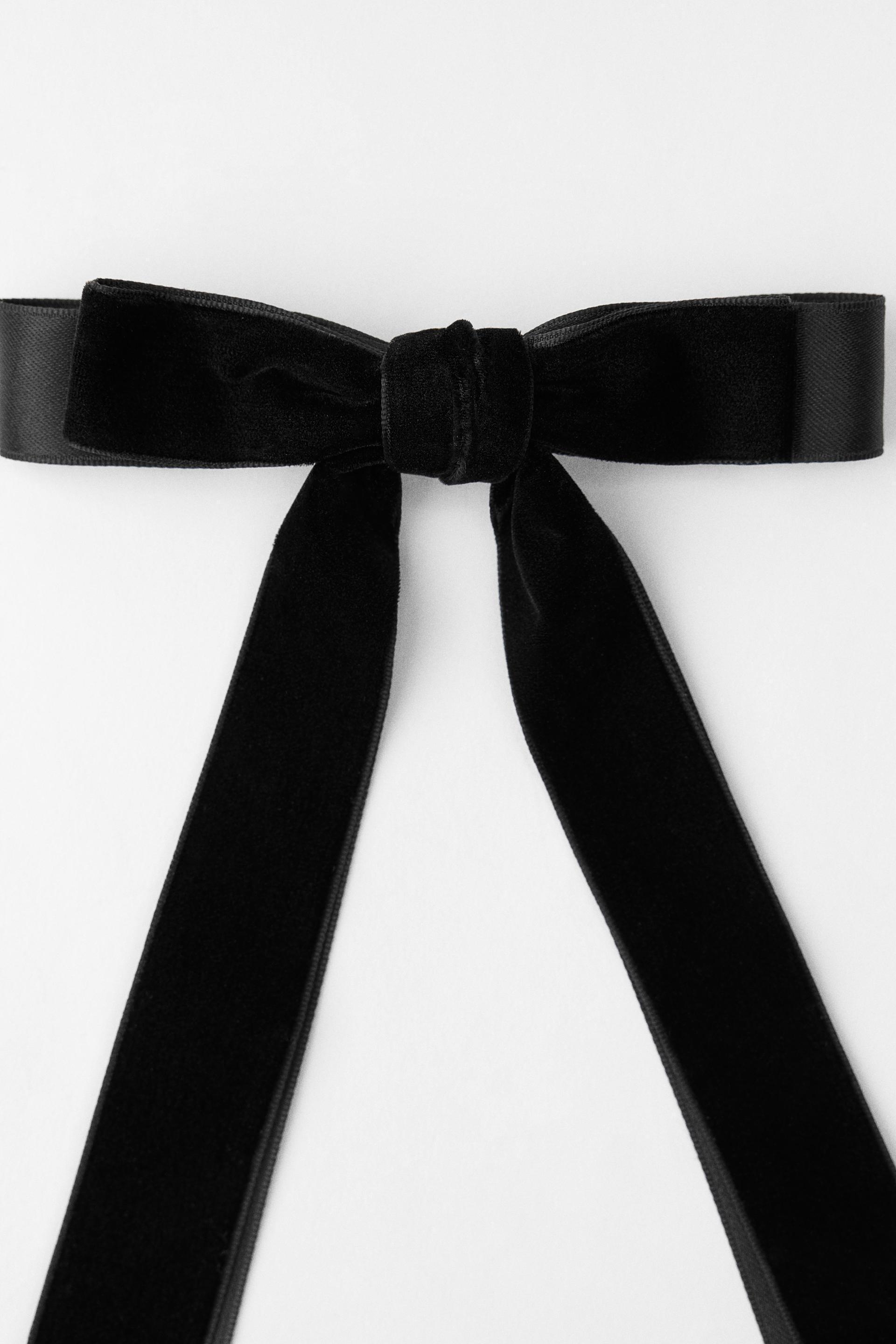 FAUX FUR CONTRASTING BOW CLIP Product Image