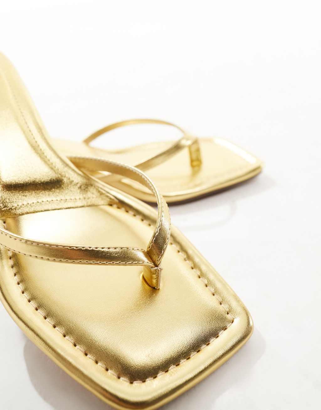 ASOS DESIGN Heatwave toe thong kitten heeled sandals in gold Product Image