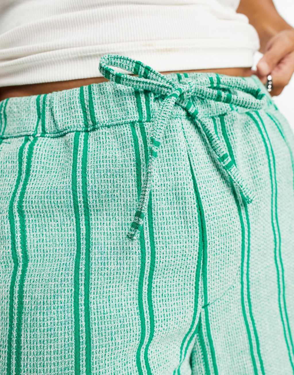 ASOS DESIGN wide cargo shorts with crinkle texture in turquoise Product Image