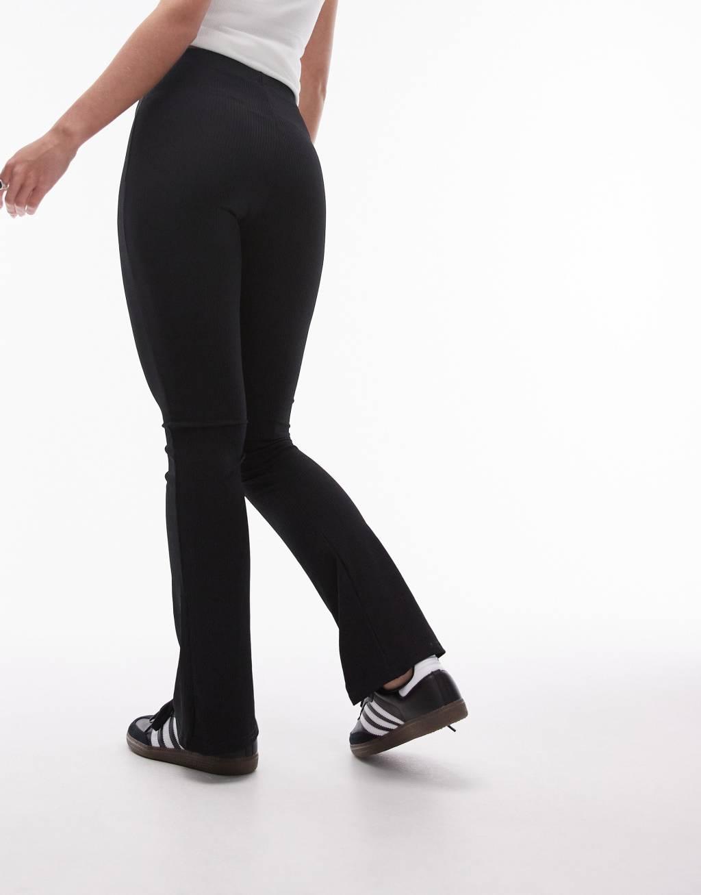 Topshop Petite skinny rib flared pants in black Product Image