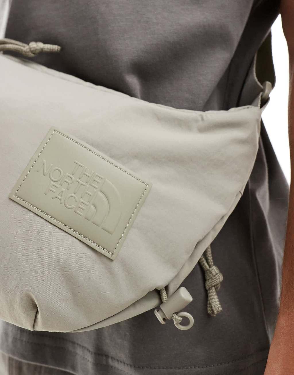 The North Face Never Stop sling cross body bag in clay gray Product Image