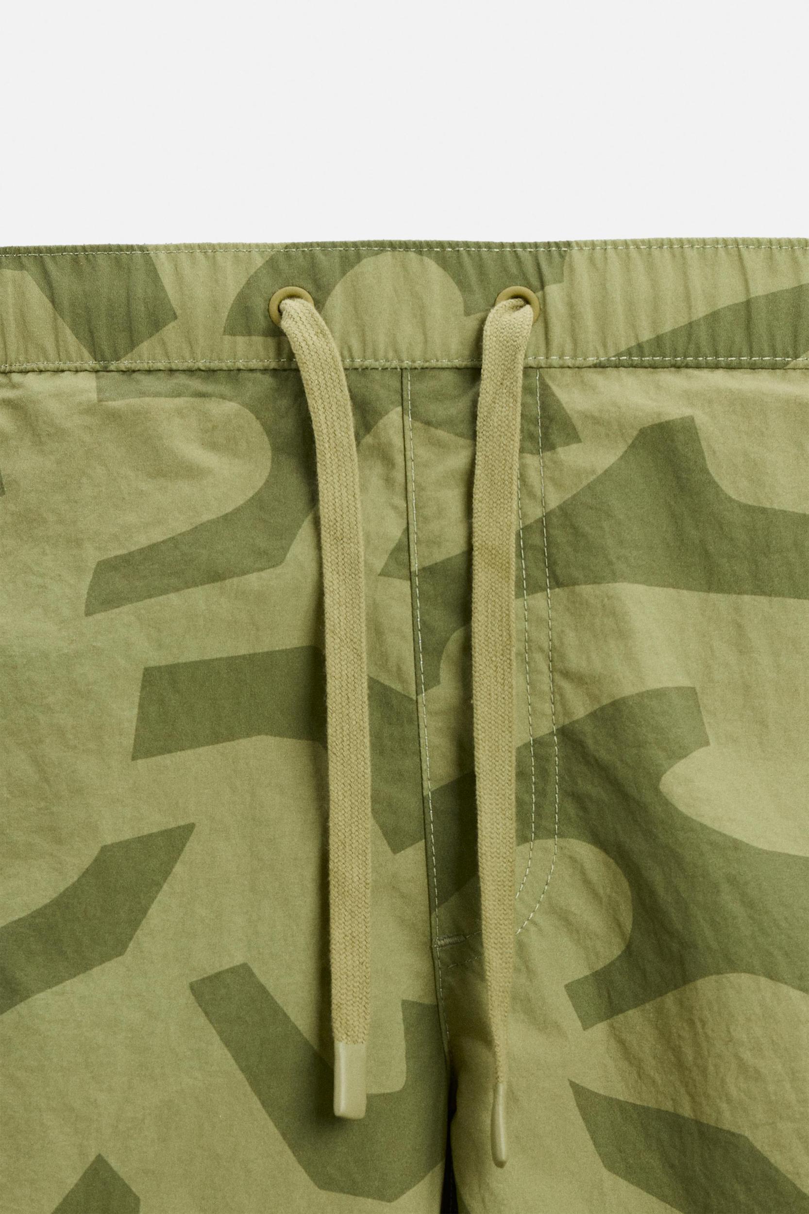 LONG ABSTRACT PRINTED SWIMMING TRUNKS Product Image