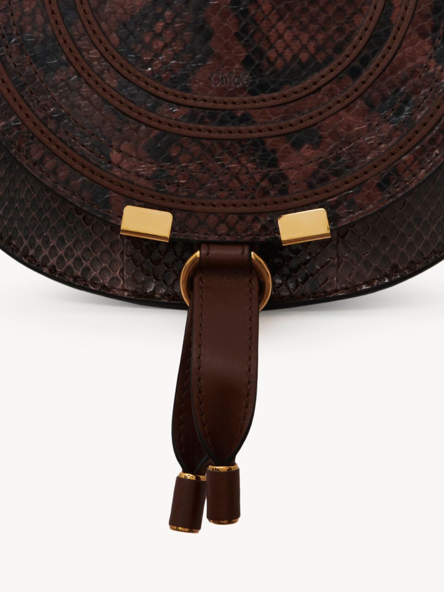 Small Marcie saddle bag in python-effect leather Product Image