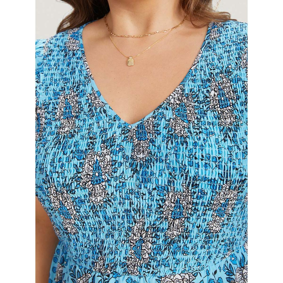 Plus Size Floral Print Shirred Ruffle Cap Sleeve Layered Hem Dress Cerulean Women Elegant Shirred V-neck Cap Sleeve Curvy Knee Dress BloomChic 26/4X Product Image