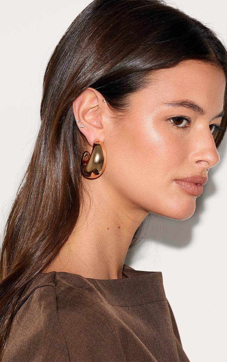 Gold Curved Hoop Earrings Product Image