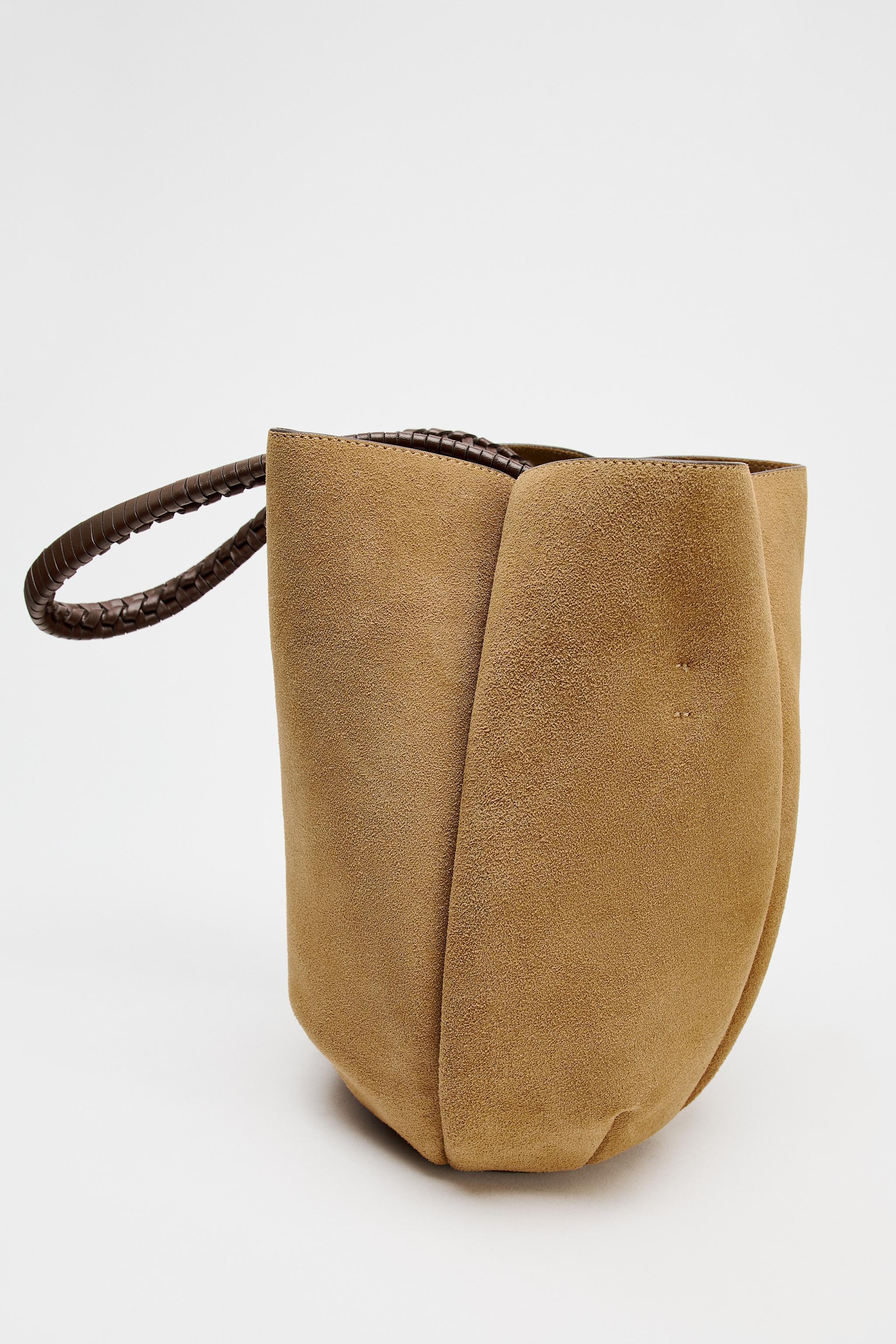 WOVEN SPLIT LEATHER FLOWER BUCKET BAG Product Image