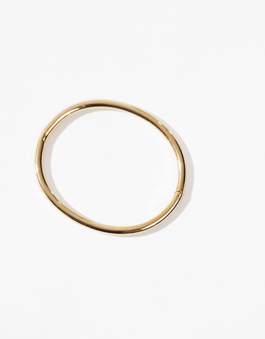 ASOS DESIGN waterproof stainless steel simple bangle in gold tone Product Image