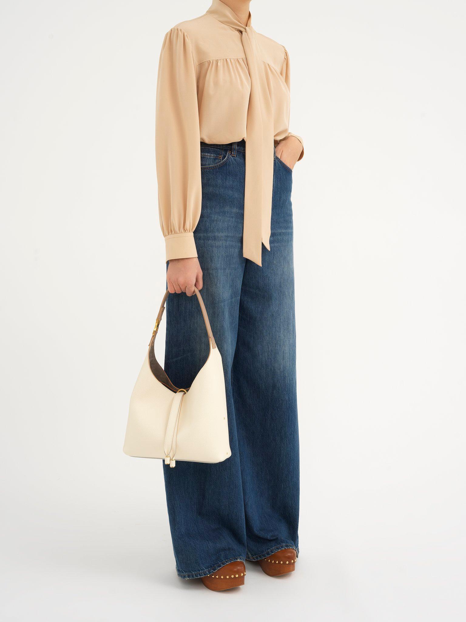 Small Marcie hobo bag in grained leather Product Image