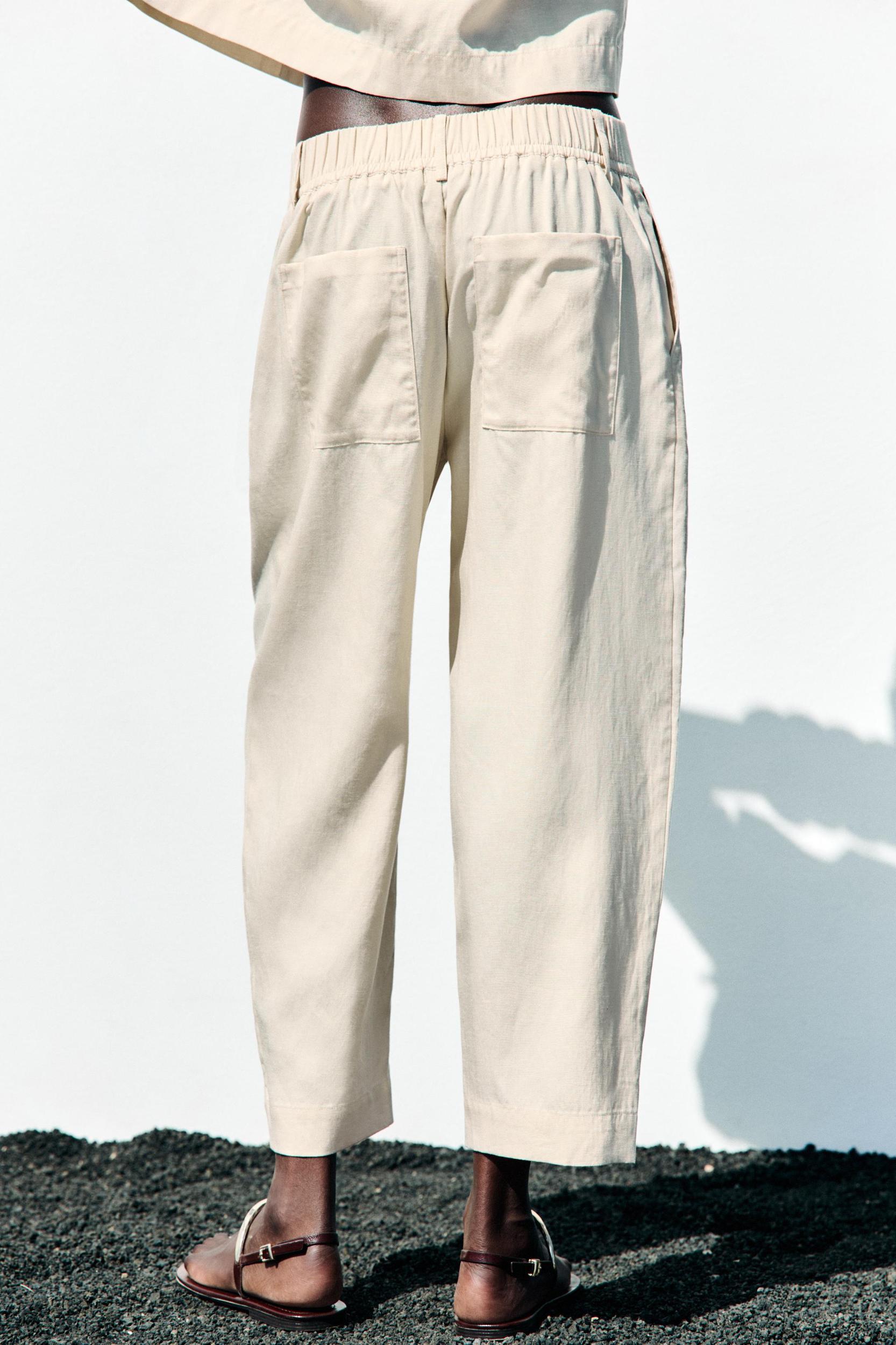 PLEATED ELASTIC WAIST PANTS Product Image