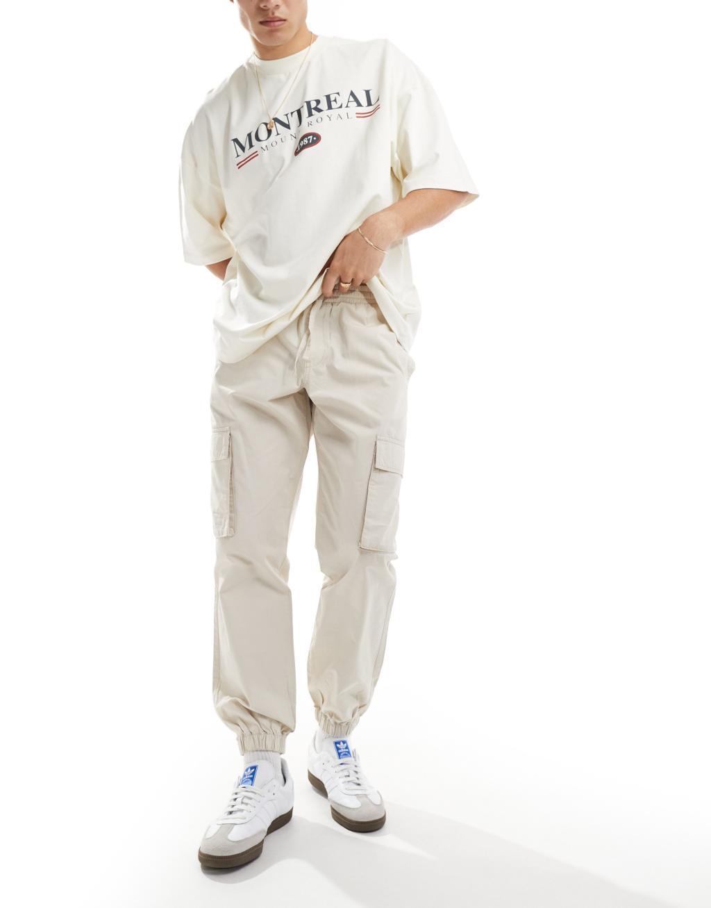 ASOS DESIGN tapered pull on pants in stone Product Image