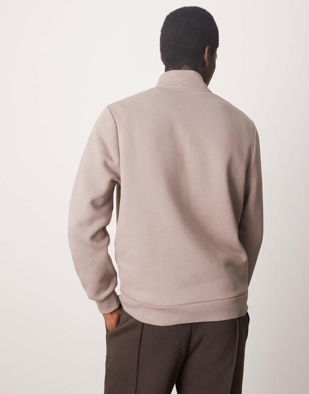 ASOS DESIGN quarter zip sweatshirt in brown Product Image