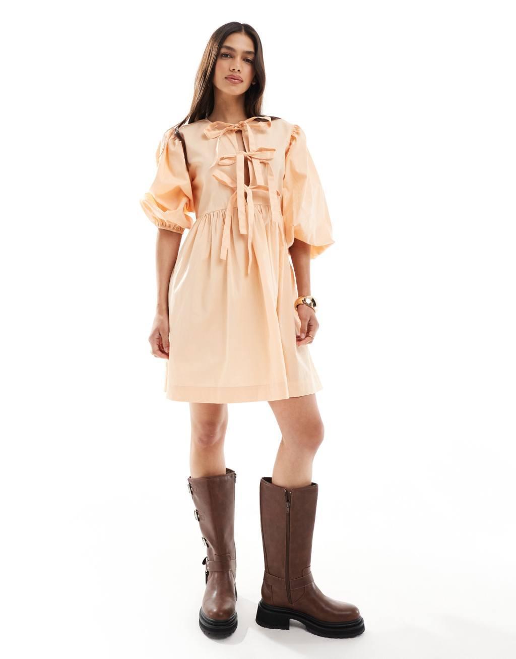 ASOS DESIGN bow tie front mini smock dress in peach fuzz  Product Image