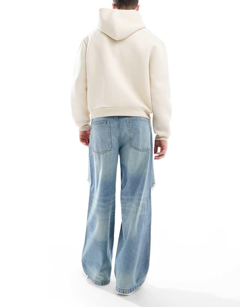 ASOS DESIGN super baggy jeans with rips in vintage light wash blue Product Image