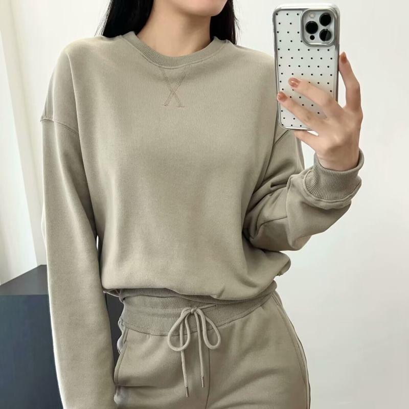 Long-Sleeve Round Neck Plain Sweatshirt / Mid Waist Plain Flared Pants Product Image