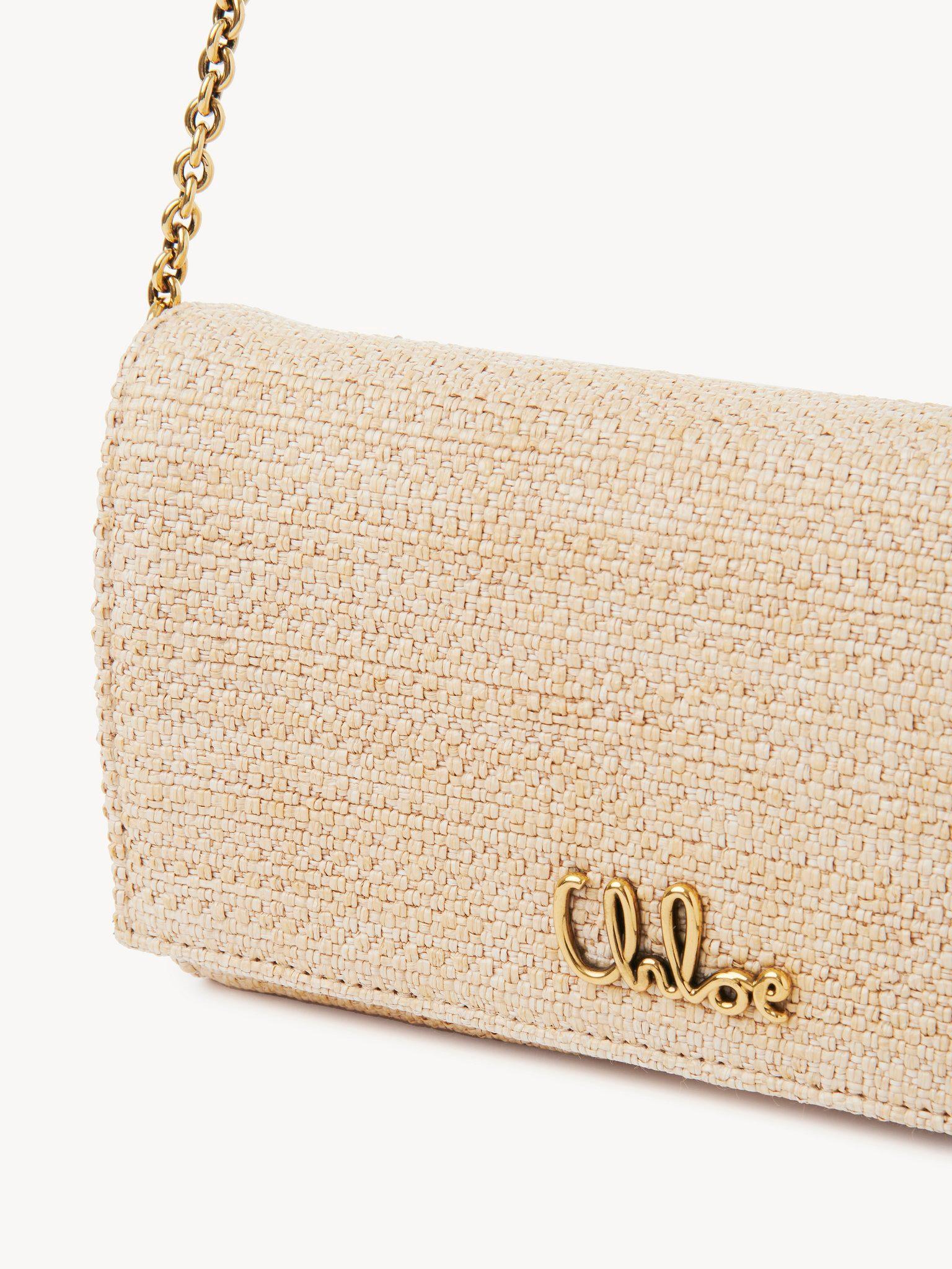 Chloé Iconic flap wallet on chain in raffia-effect fibers Product Image