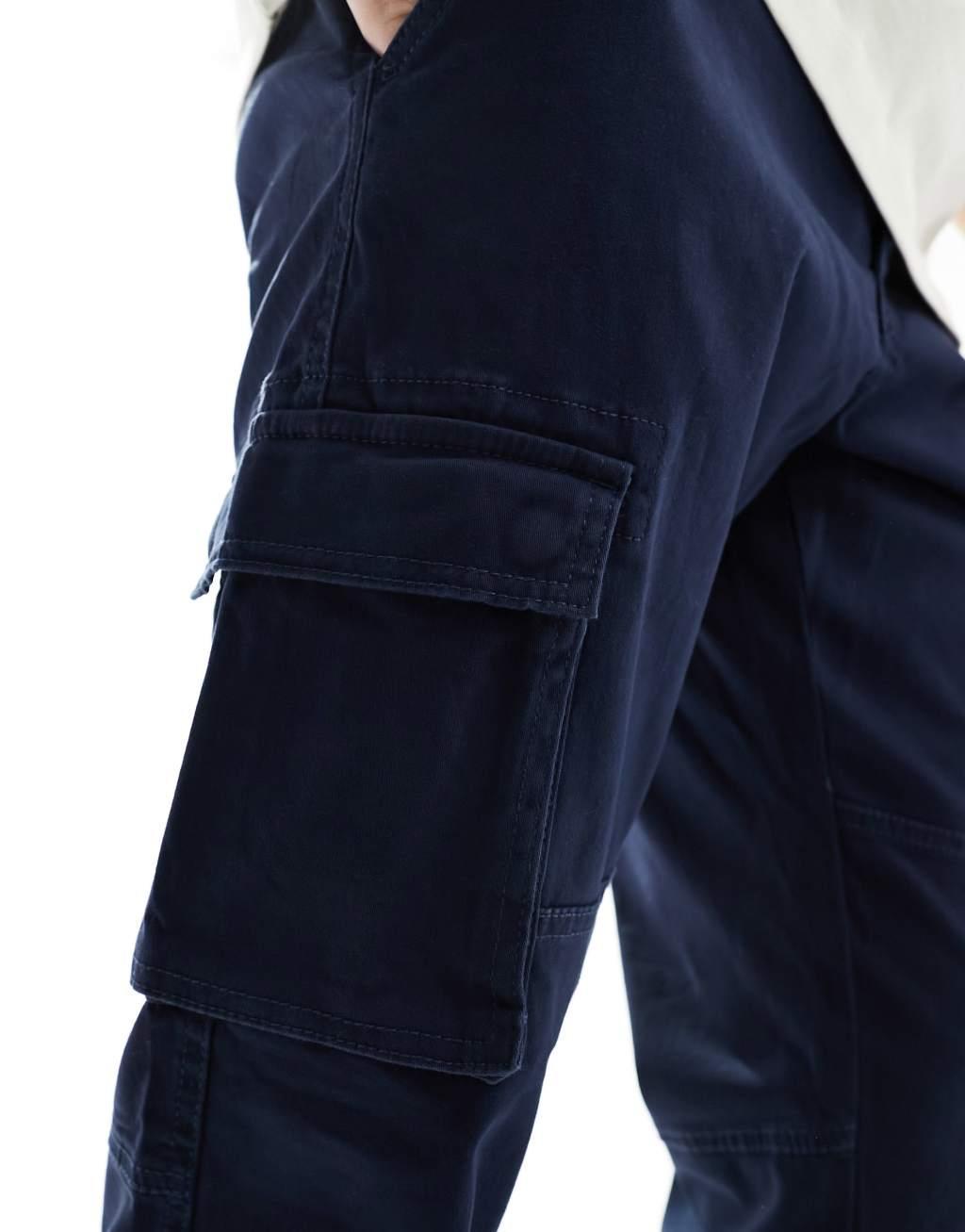 ONLY & SONS tapered fit cargo pants with cuffed bottoms in navy Product Image