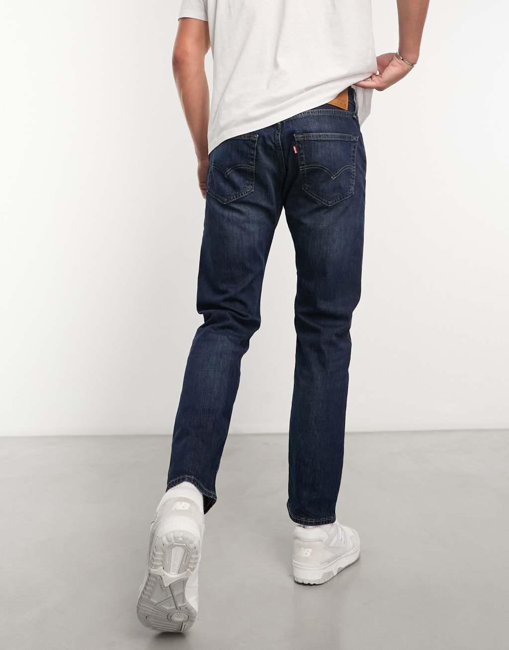 Levi's 502 tapered fit jeans in dark navy wash Product Image