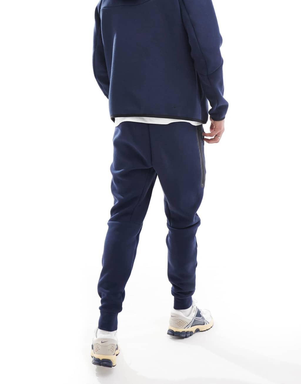 Nike Tech Fleece cuffed sweatpants in navy Product Image