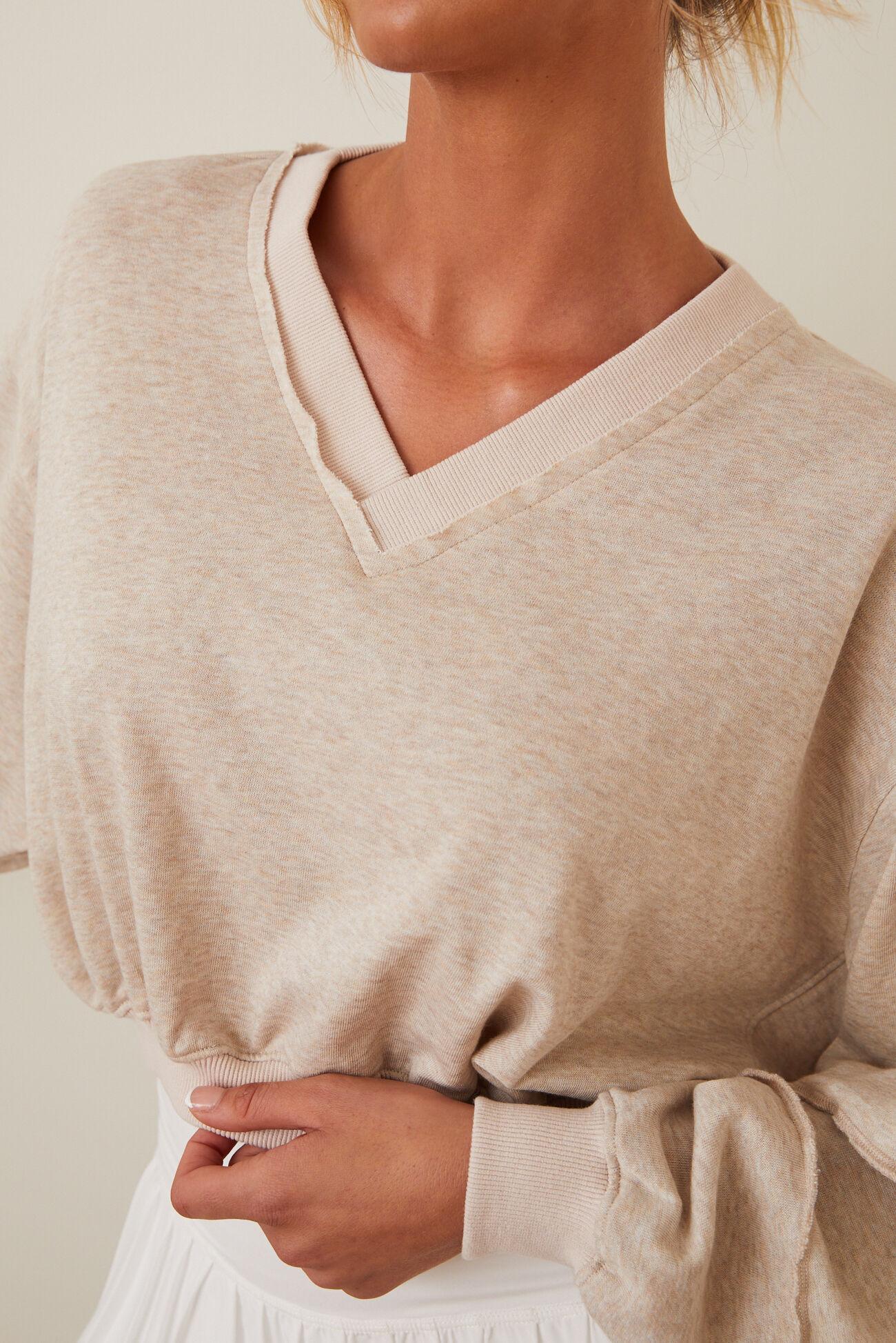 Kick Back Heathered Long Sleeve Crop Product Image