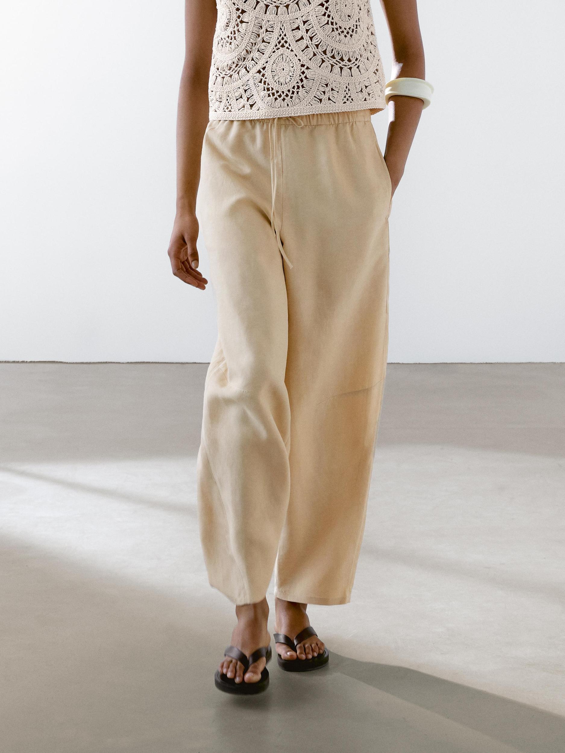 Flowing linen blend barrel fit trousers Product Image