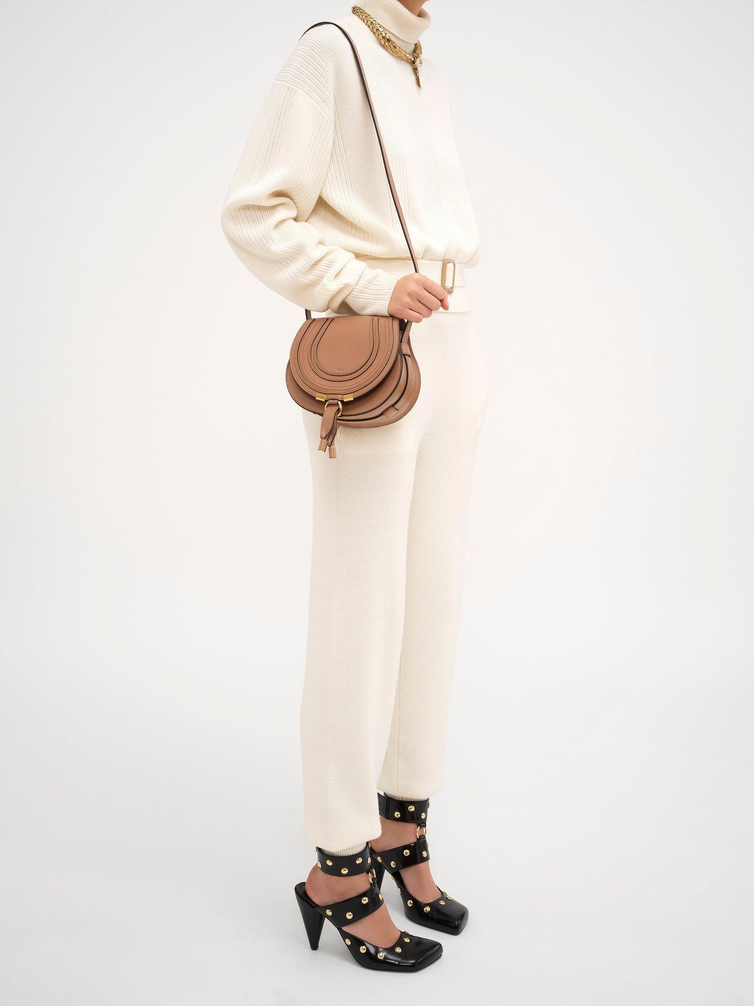 Small Marcie saddle bag in shiny leather Product Image