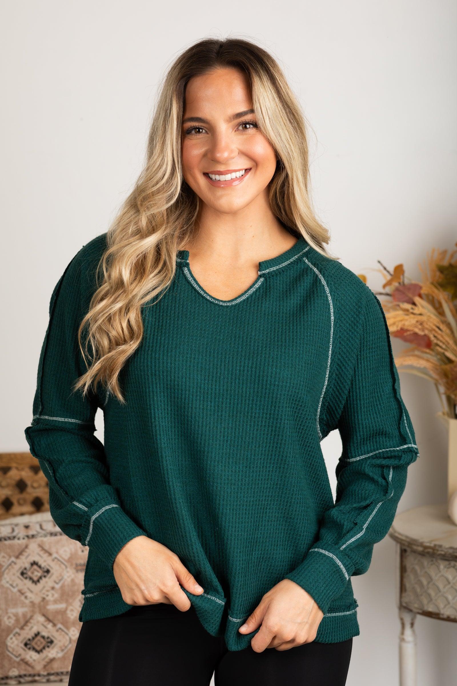 Notched Neck With Exposed Seams Knit Top Product Image