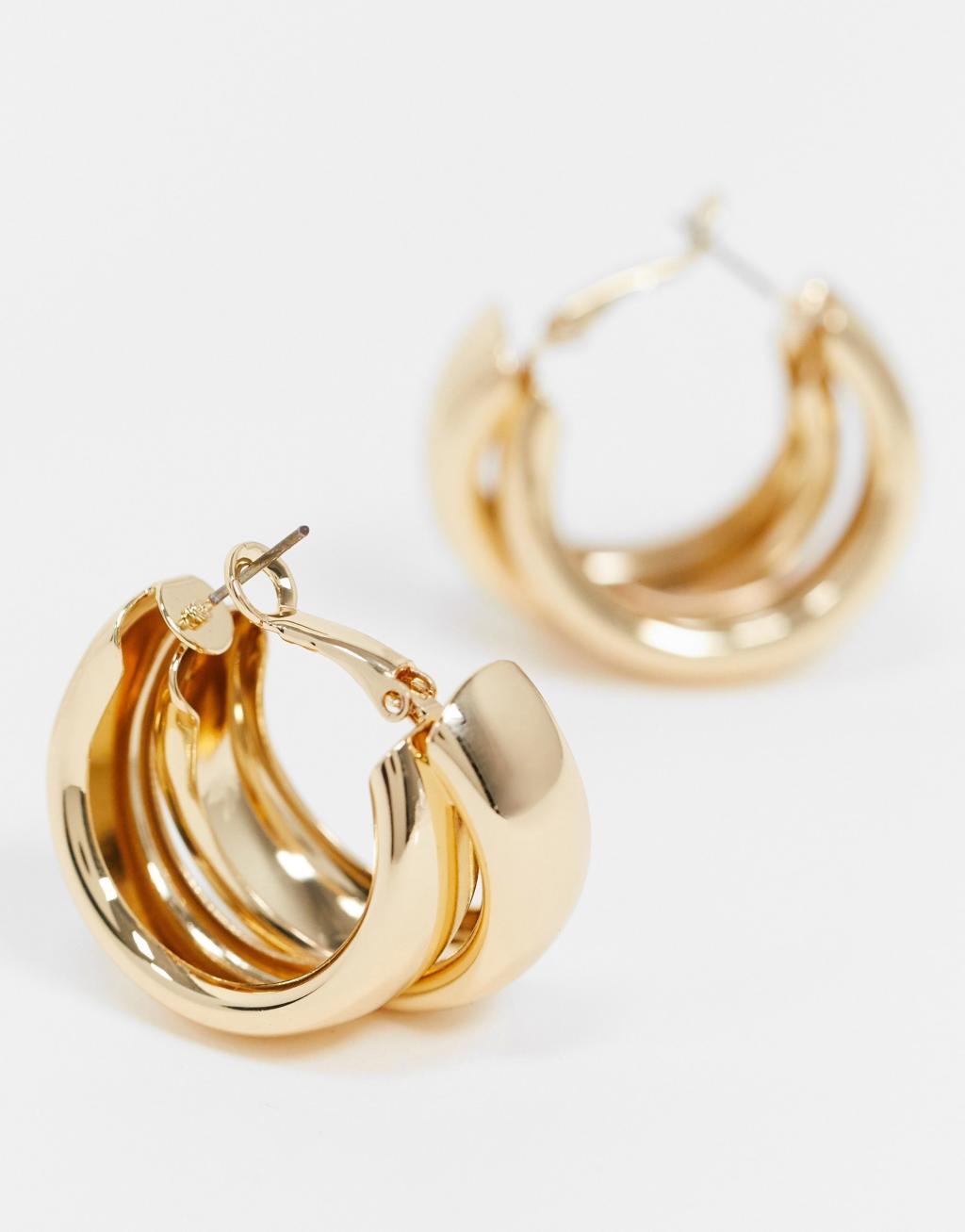 ASOS DESIGN hoop earrings with thick crossover design gold tone Product Image