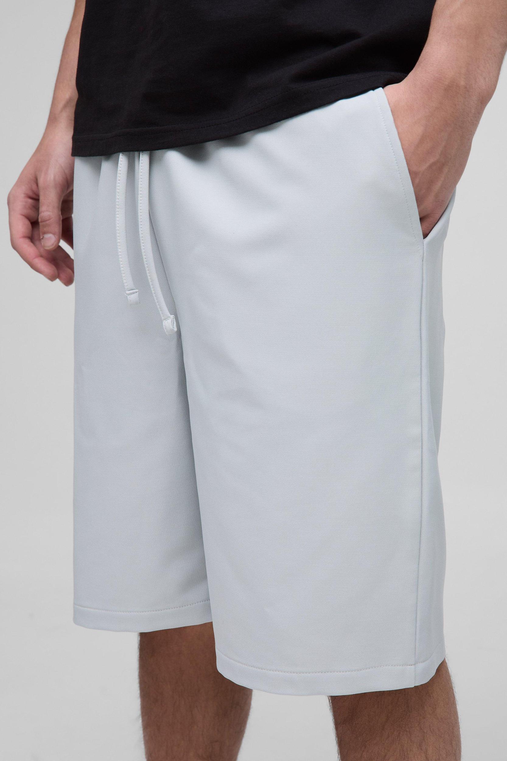 Elasticated Waist Relaxed Technical Stretch Shorts | boohooMAN USA Product Image