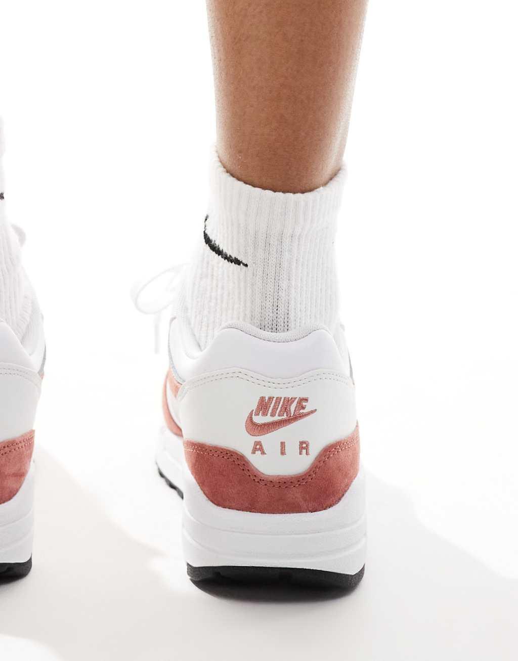 Nike Air Max 1 sneakers in white and pink Product Image