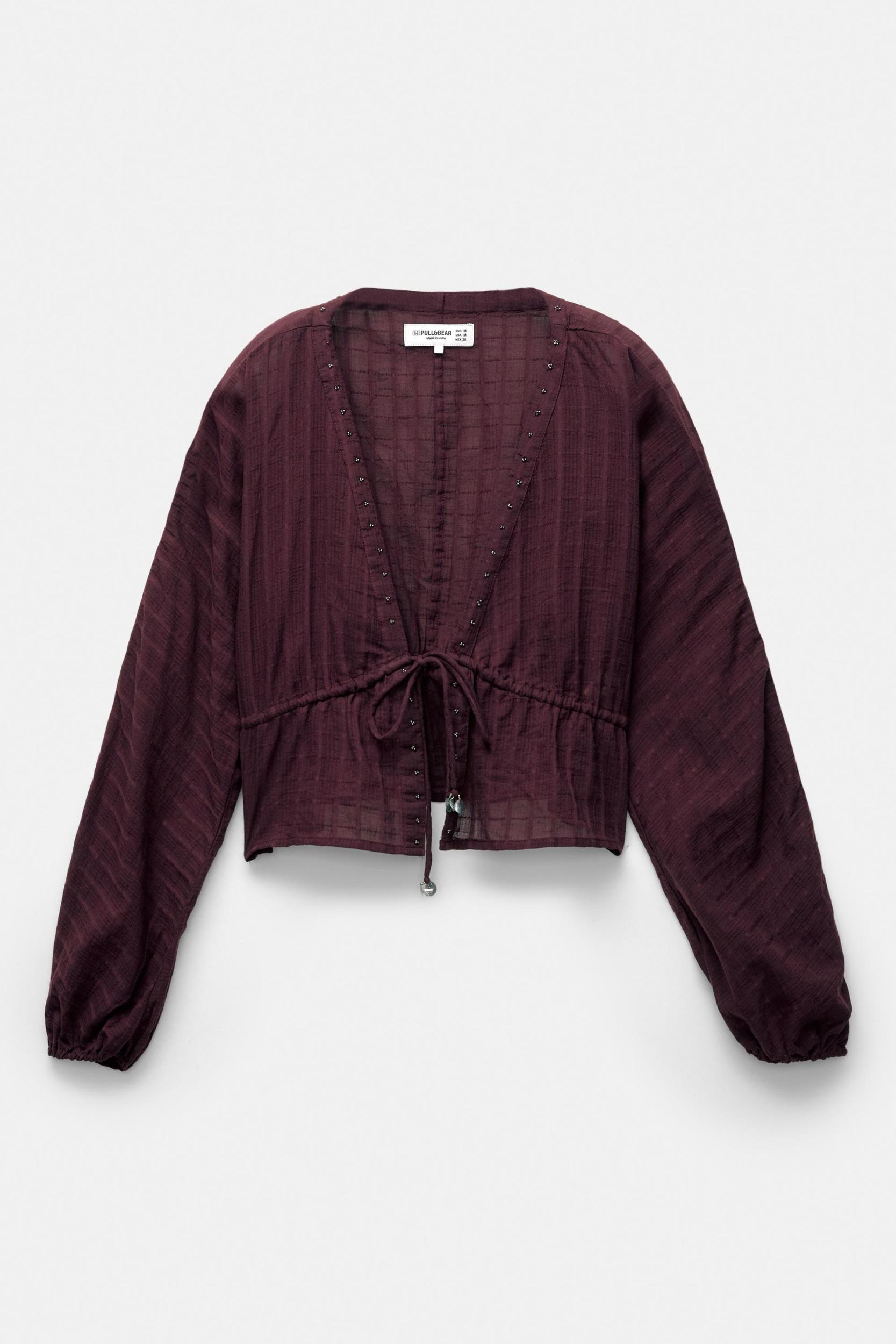 Beaded blouse with bow Product Image