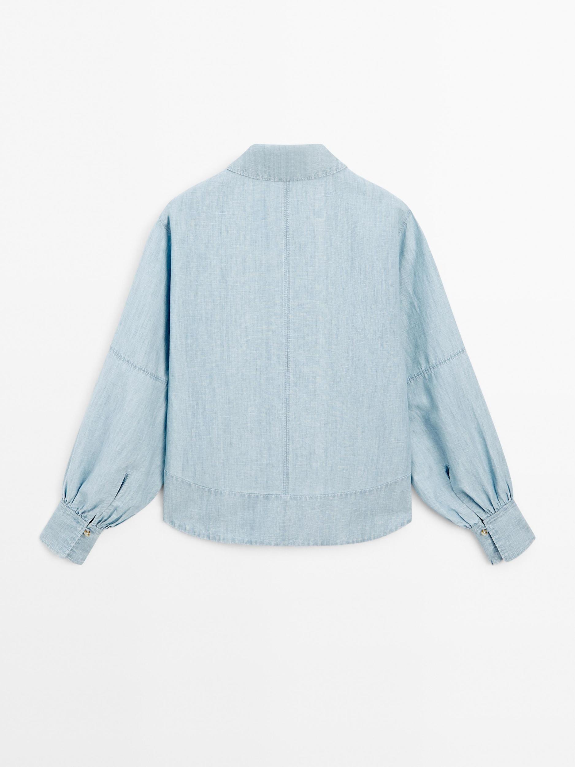 Oversize denim blouse with puff sleeves Product Image