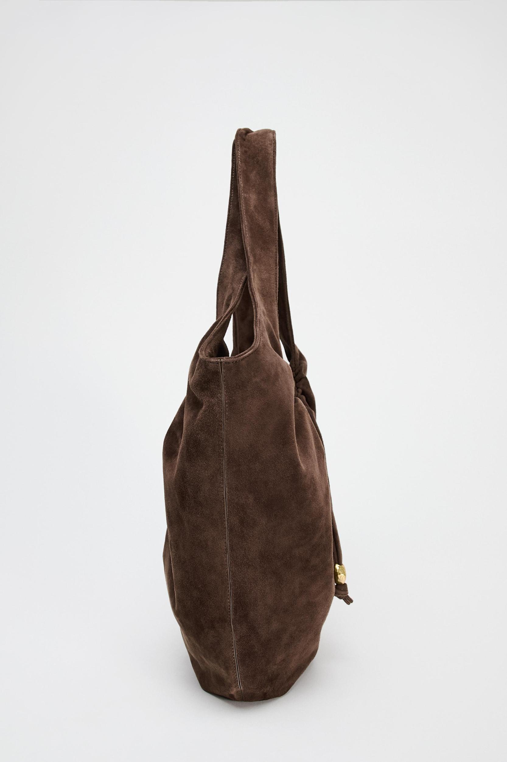 RUCHED SPLIT LEATHER BUCKET BAG Product Image