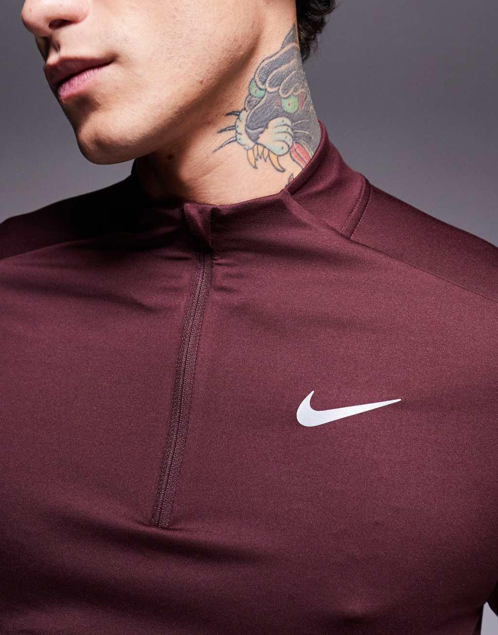 Nike Running Element half zip sweatshirt in burgundy Product Image