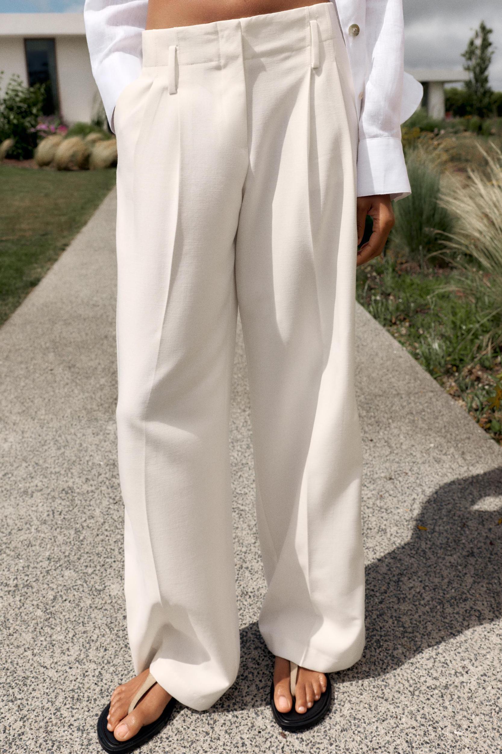 PLEATED WIDE LEG PANTS Product Image