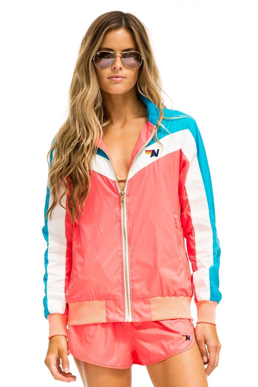 WINDBREAKER JACKET- NEON CORAL Female Product Image