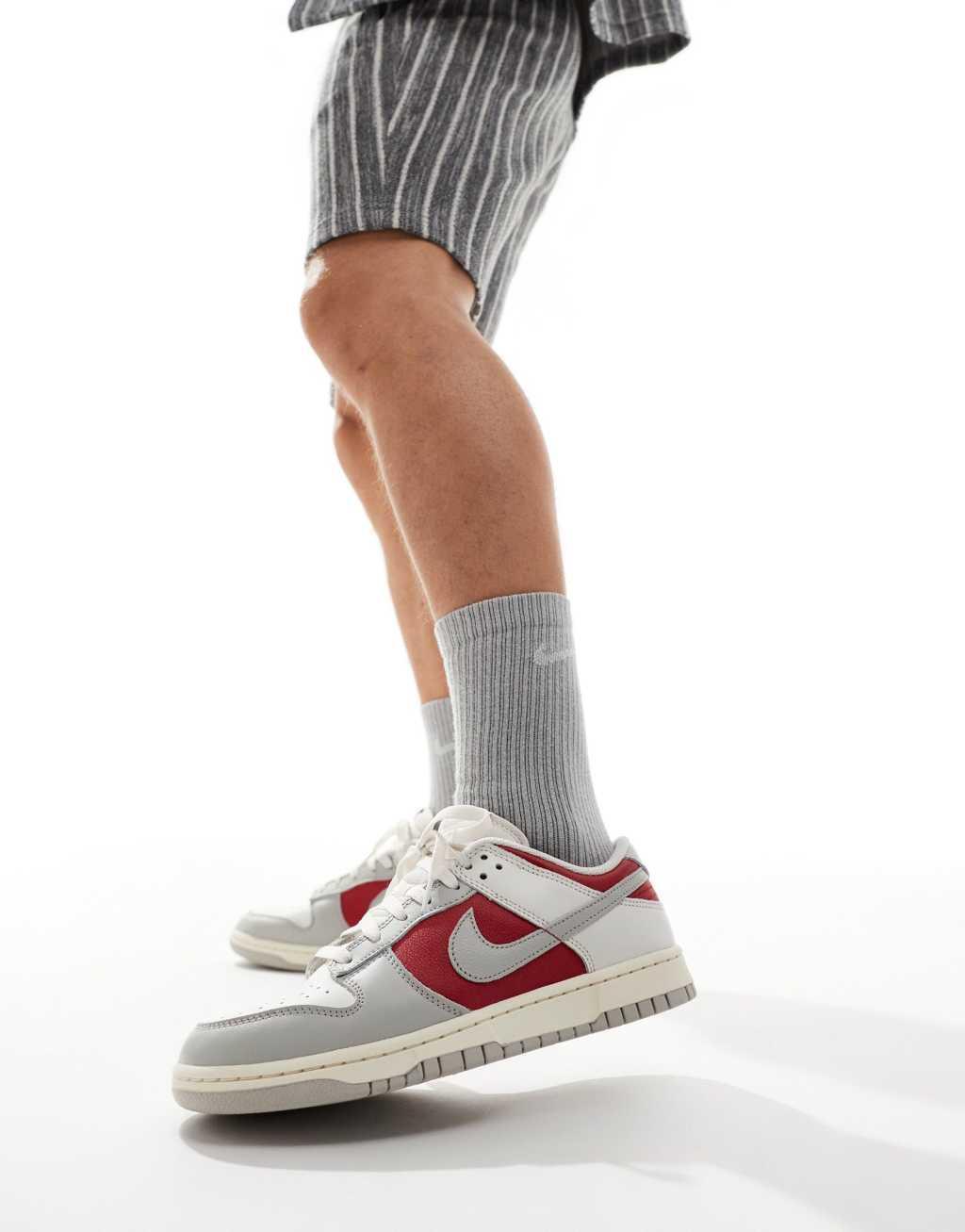 Nike Dunk Low Retro sneakers in off white and red Product Image