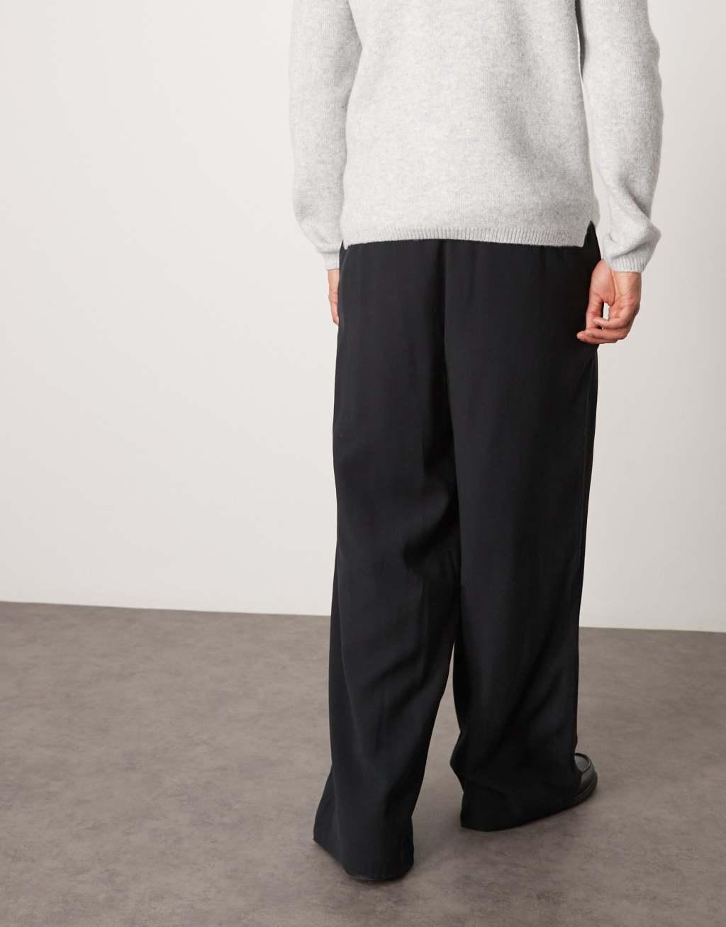 ASOS DESIGN oversized smart pants with wrap pleats in black Product Image