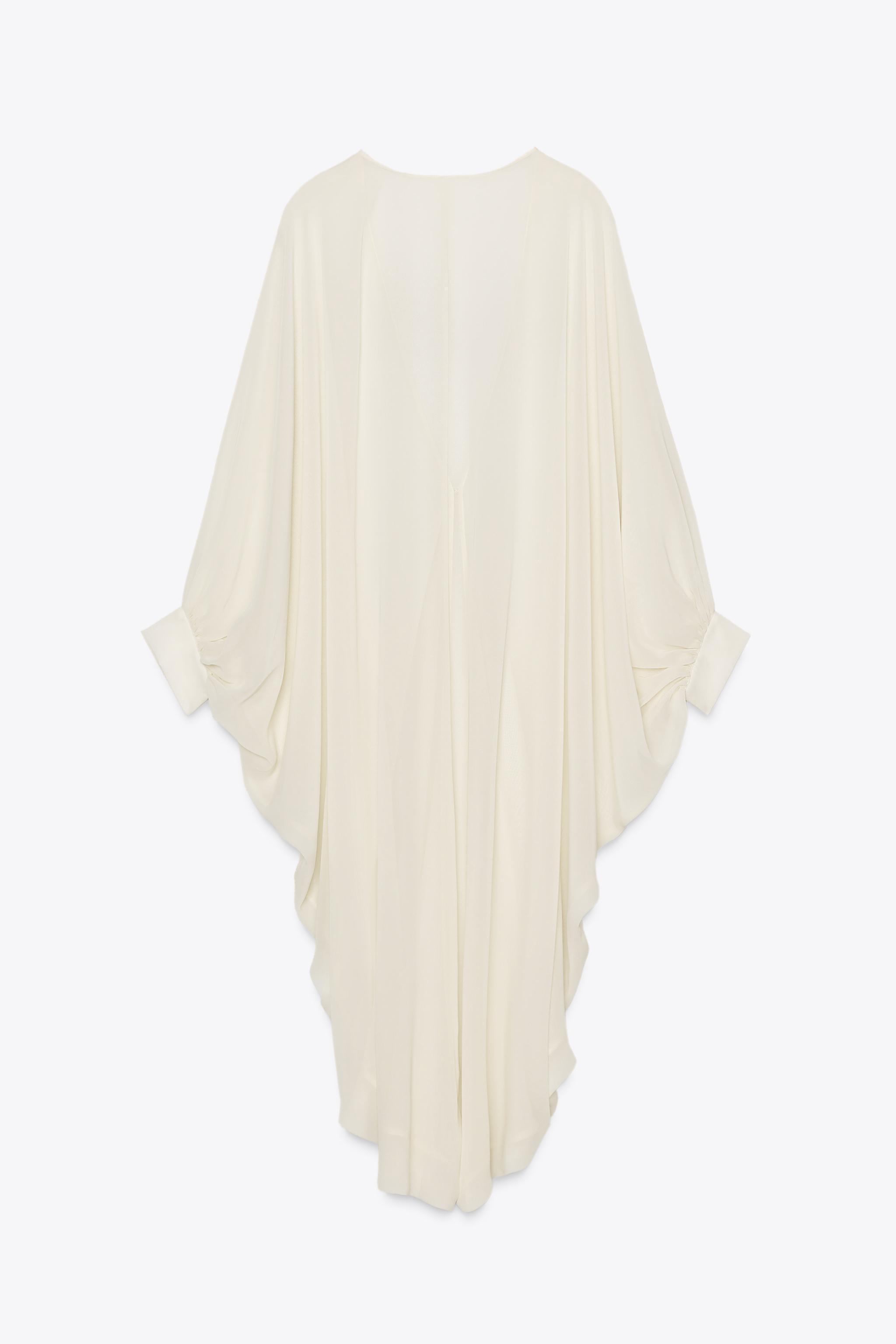 LIMITED EDITION SEMI-SHEER CAPE Product Image