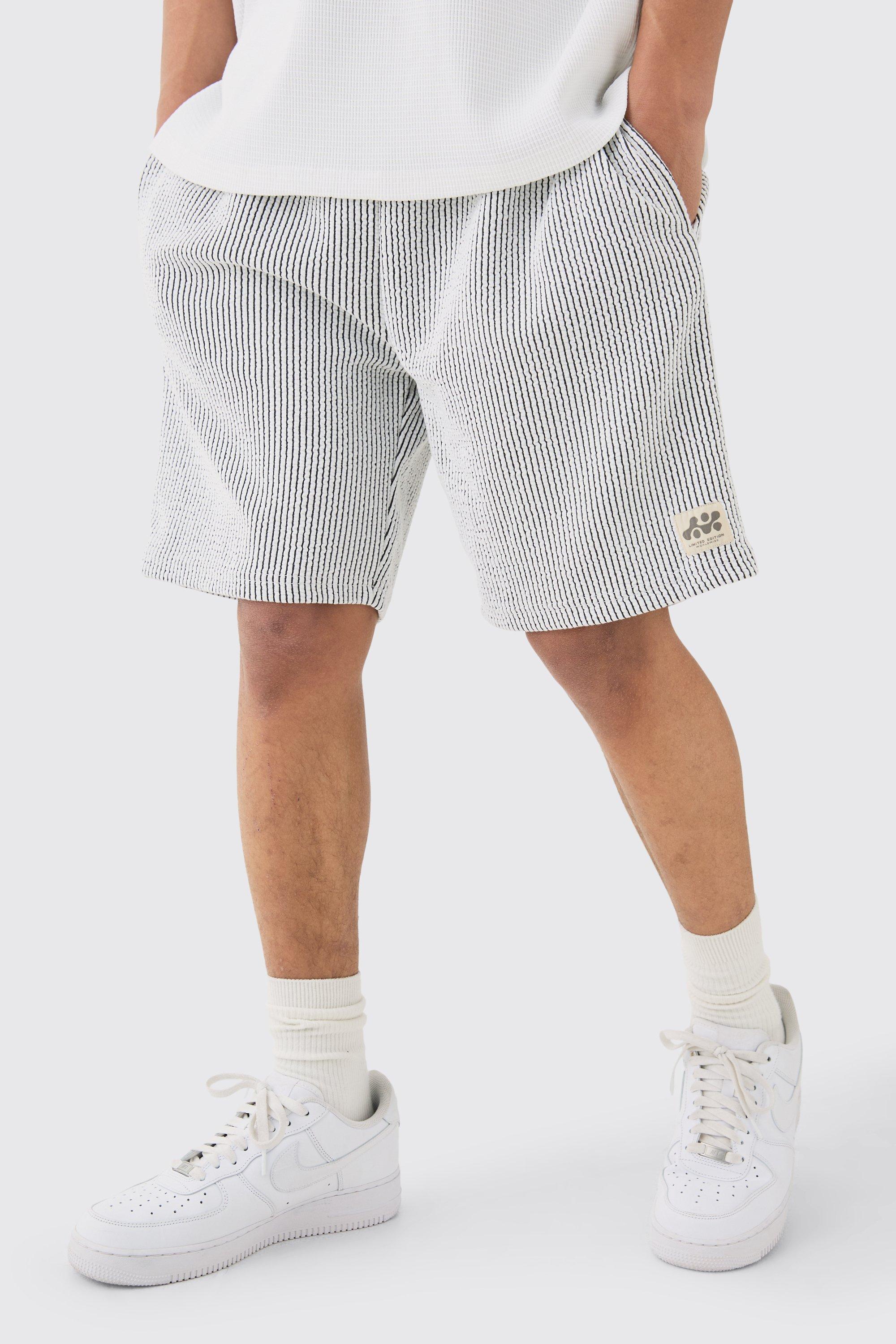 Relaxed Mid Length Textured Short With Woven Tab | boohooMAN USA Product Image